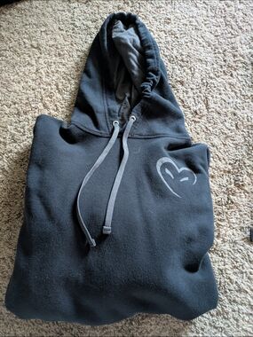 Black Hooded Sweatshirt with Subtle Heart Graphic